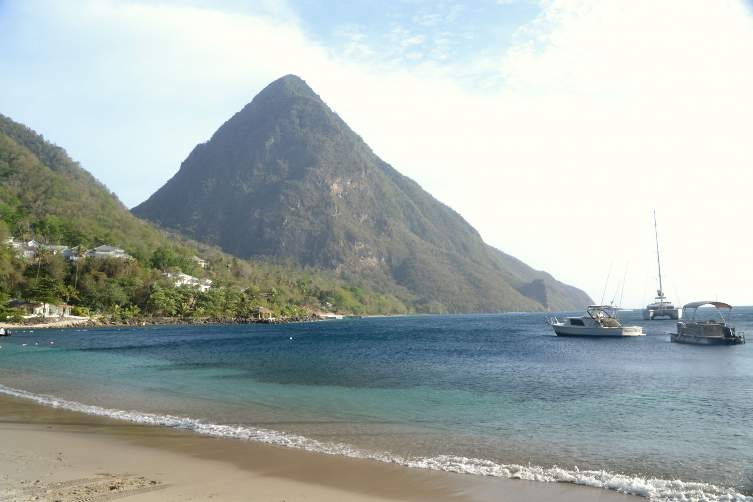 Three different boat types anchored at St. Lucia island