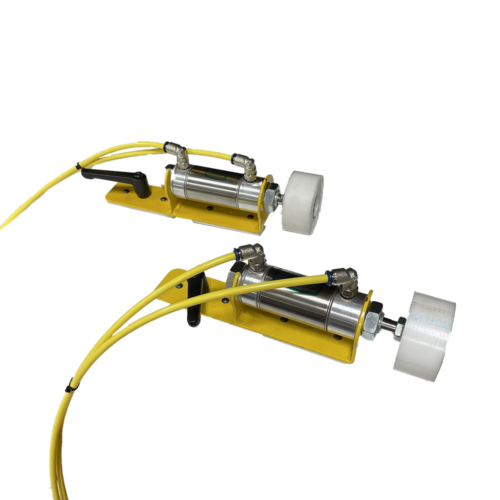 Two Pneumatic Clamps that can be added to Radial Arm Saws, Beam Saws, and Crosscut Power Saws.